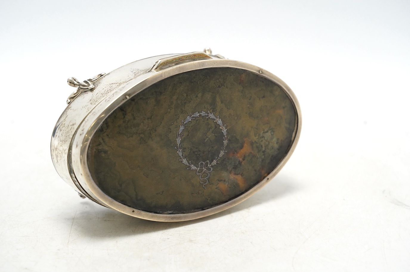 A George V silver and tortoiseshell mounted oval manicure box, E.S. Barnsley & Co Ltd, Birmingham, 1912, 13.5cm, incomplete. Condition - poor